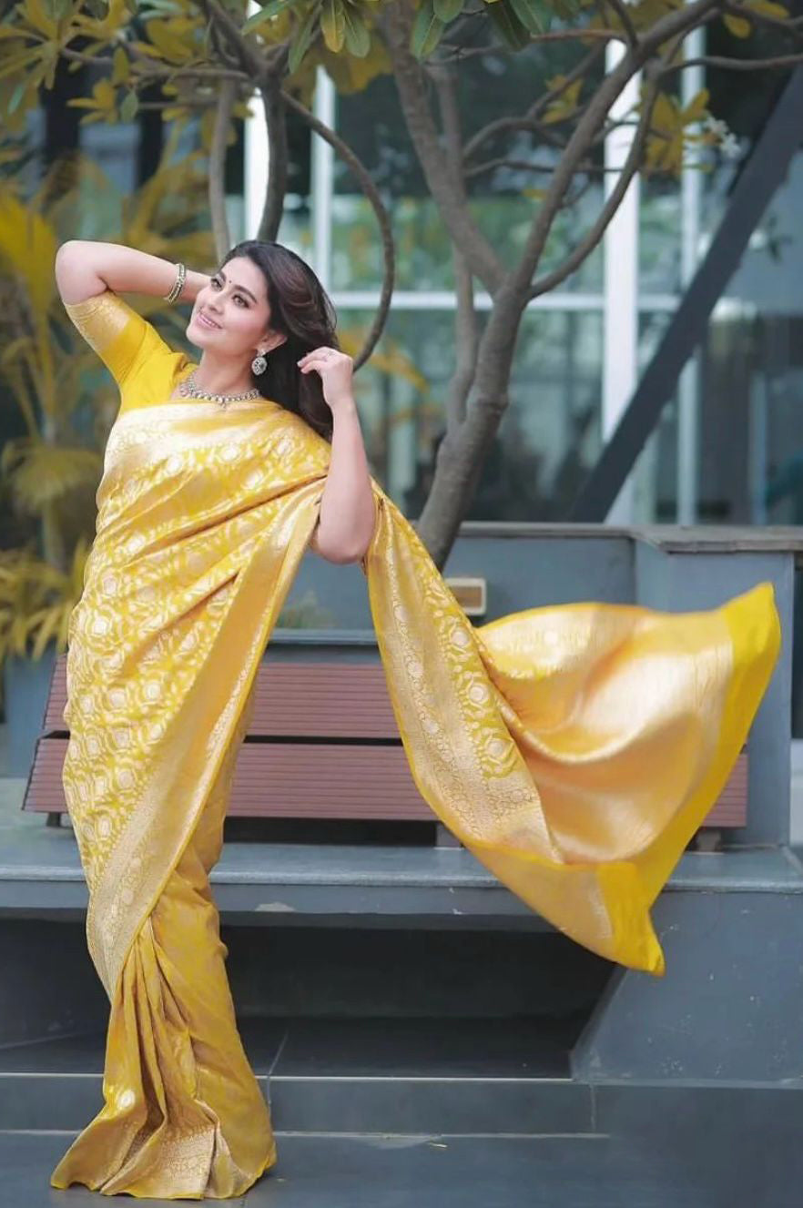 Piquant Yellow Soft Silk Saree With Embellished Blouse Piece