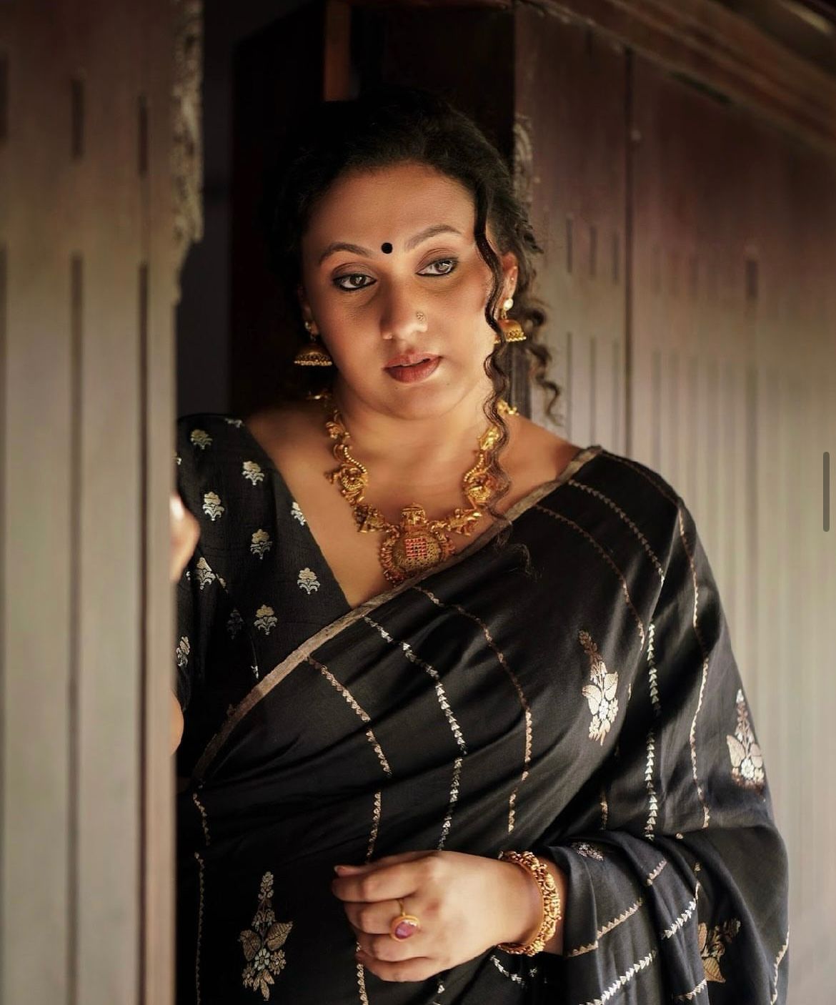 Enigmatic Black Soft Silk Saree With Enigmatic Blouse Piece