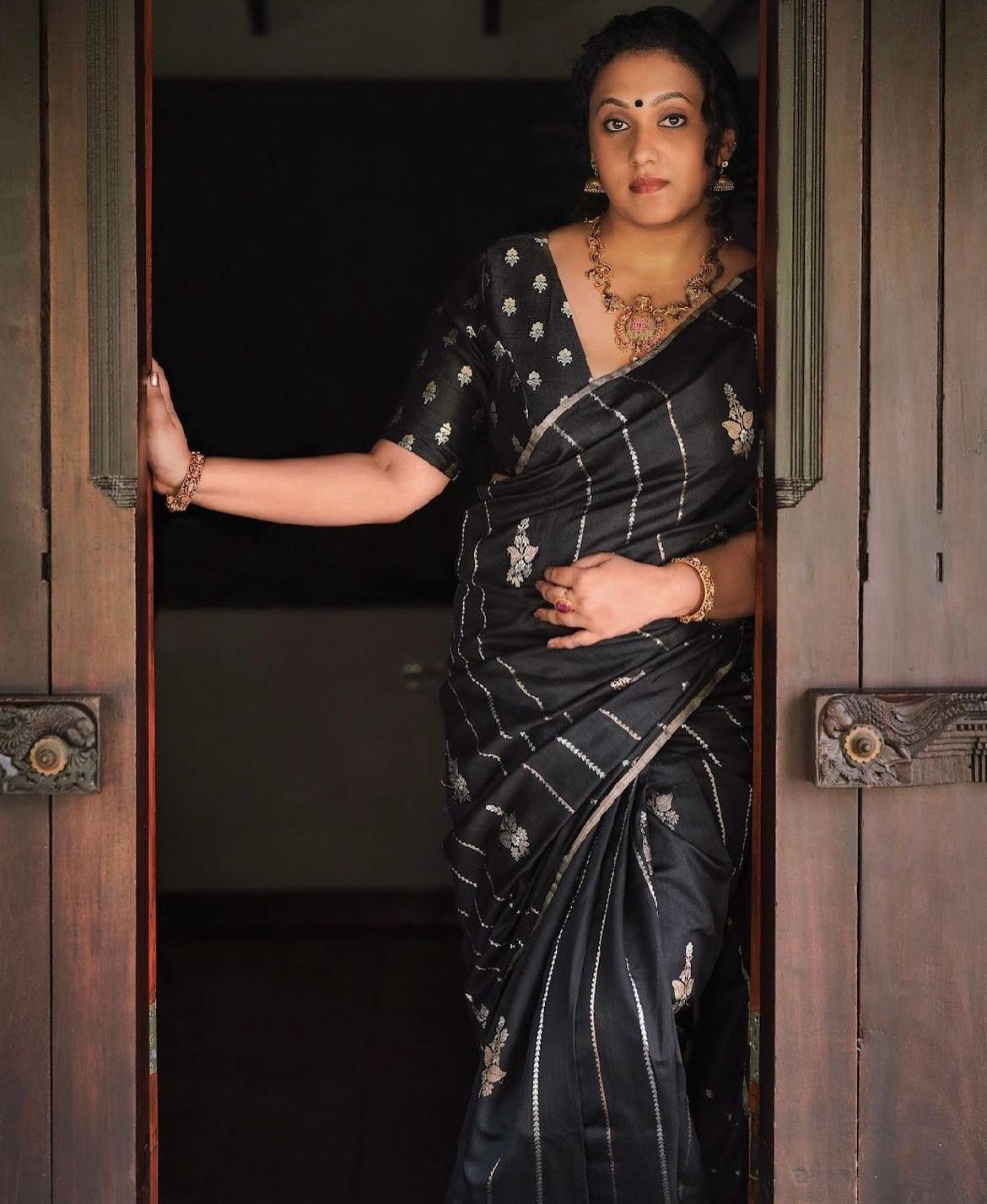 Enigmatic Black Soft Silk Saree With Enigmatic Blouse Piece