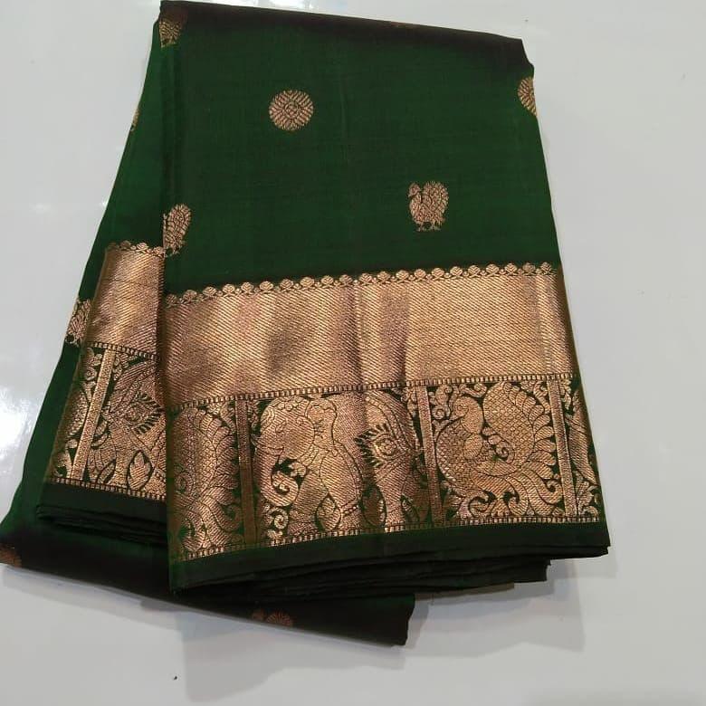 Sophisticated Dark Green Soft Silk Saree With Precious Blouse Piece