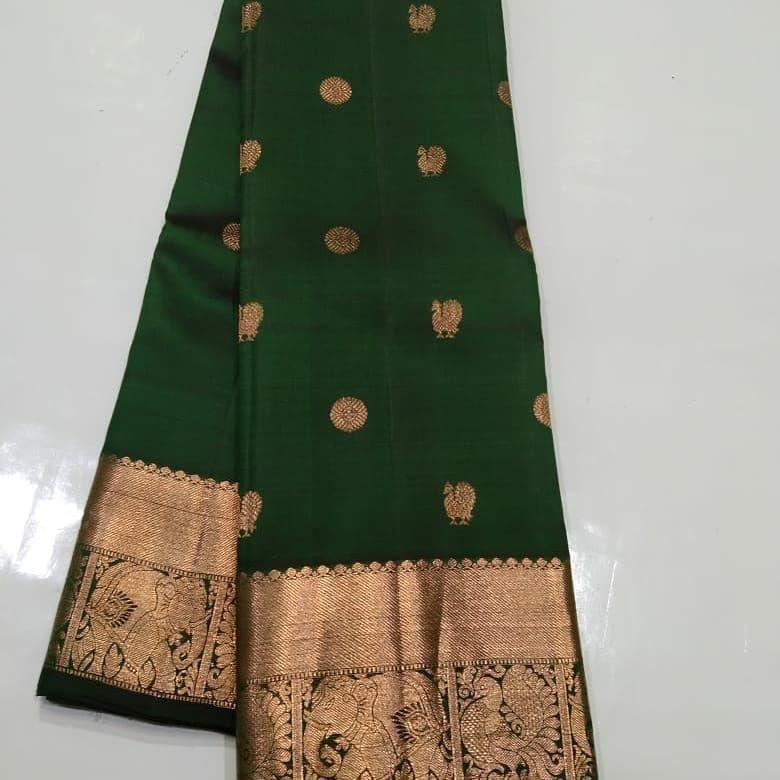 Sophisticated Dark Green Soft Silk Saree With Precious Blouse Piece