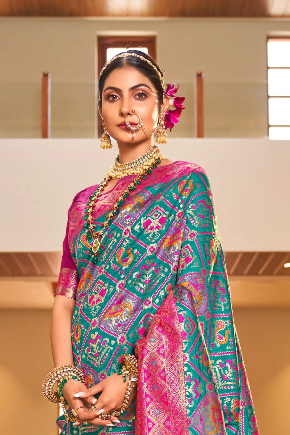 Lissome Turquoise Patola Silk Saree with Felicitous Blouse Piece