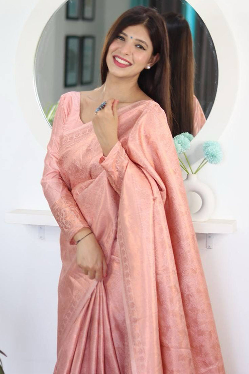 Appealing Peach Kanjivaram Silk Saree With Whimsical Blouse Piece