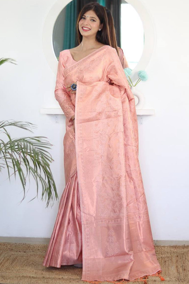 Appealing Peach Kanjivaram Silk Saree With Whimsical Blouse Piece