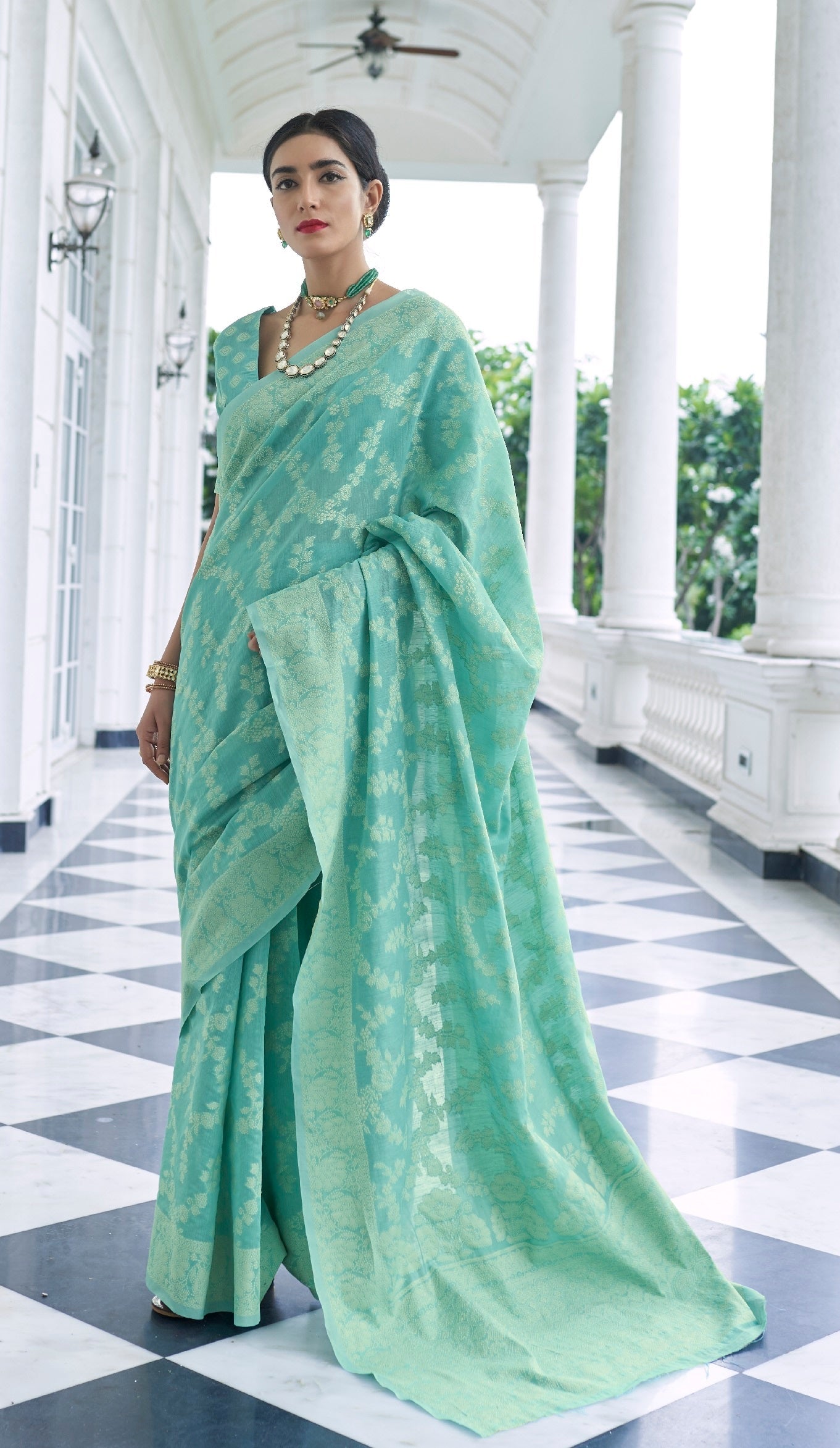 Woebegone Turquoise Lucknowi Silk Saree and Inspiring Blouse Piece