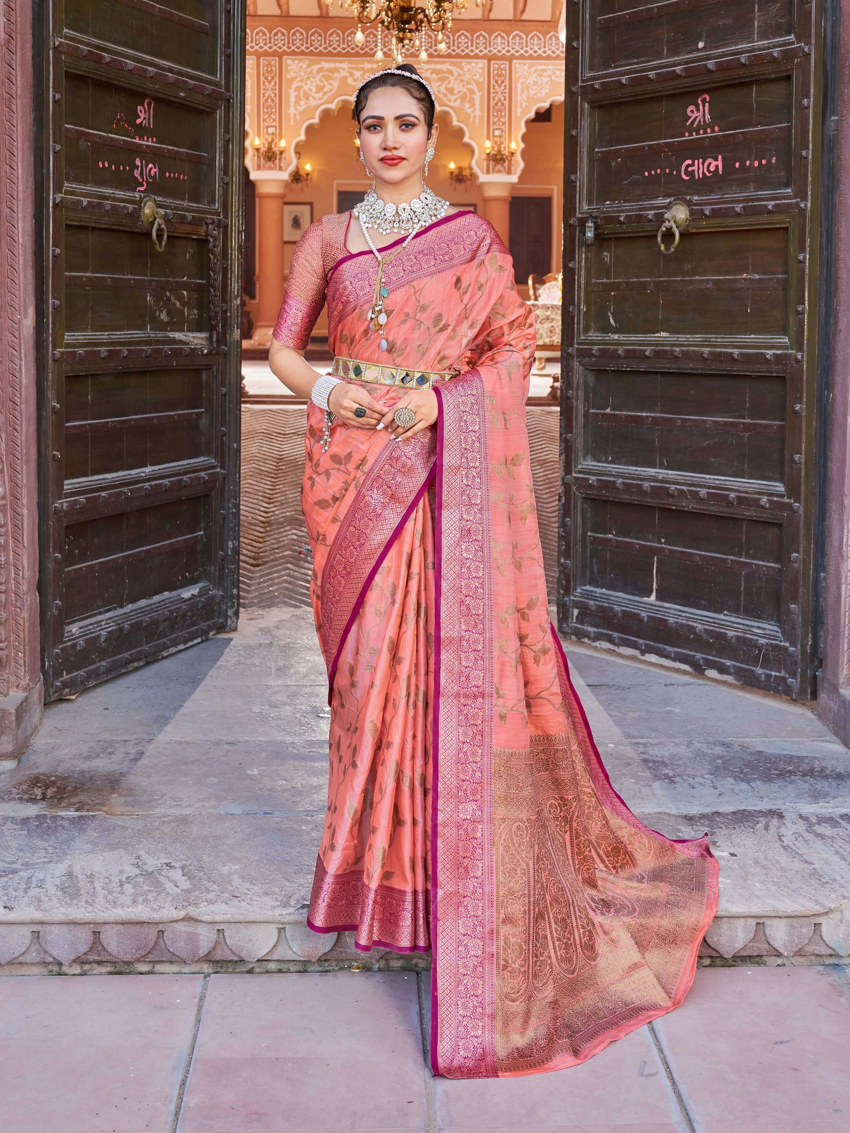 Smashing Peach Soft Banarasi Silk Saree With Flamboyant Blouse Piece