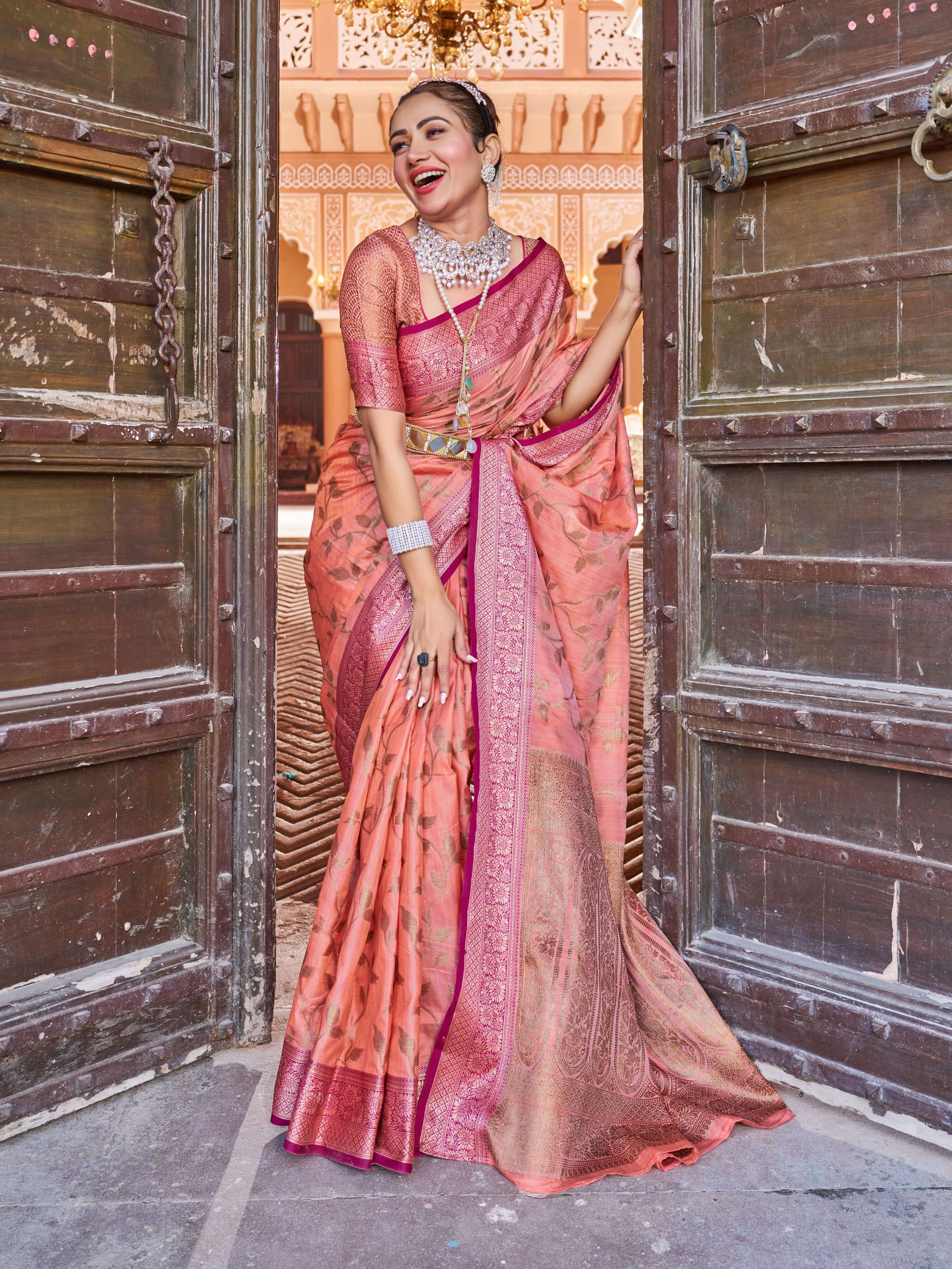 Smashing Peach Soft Banarasi Silk Saree With Flamboyant Blouse Piece