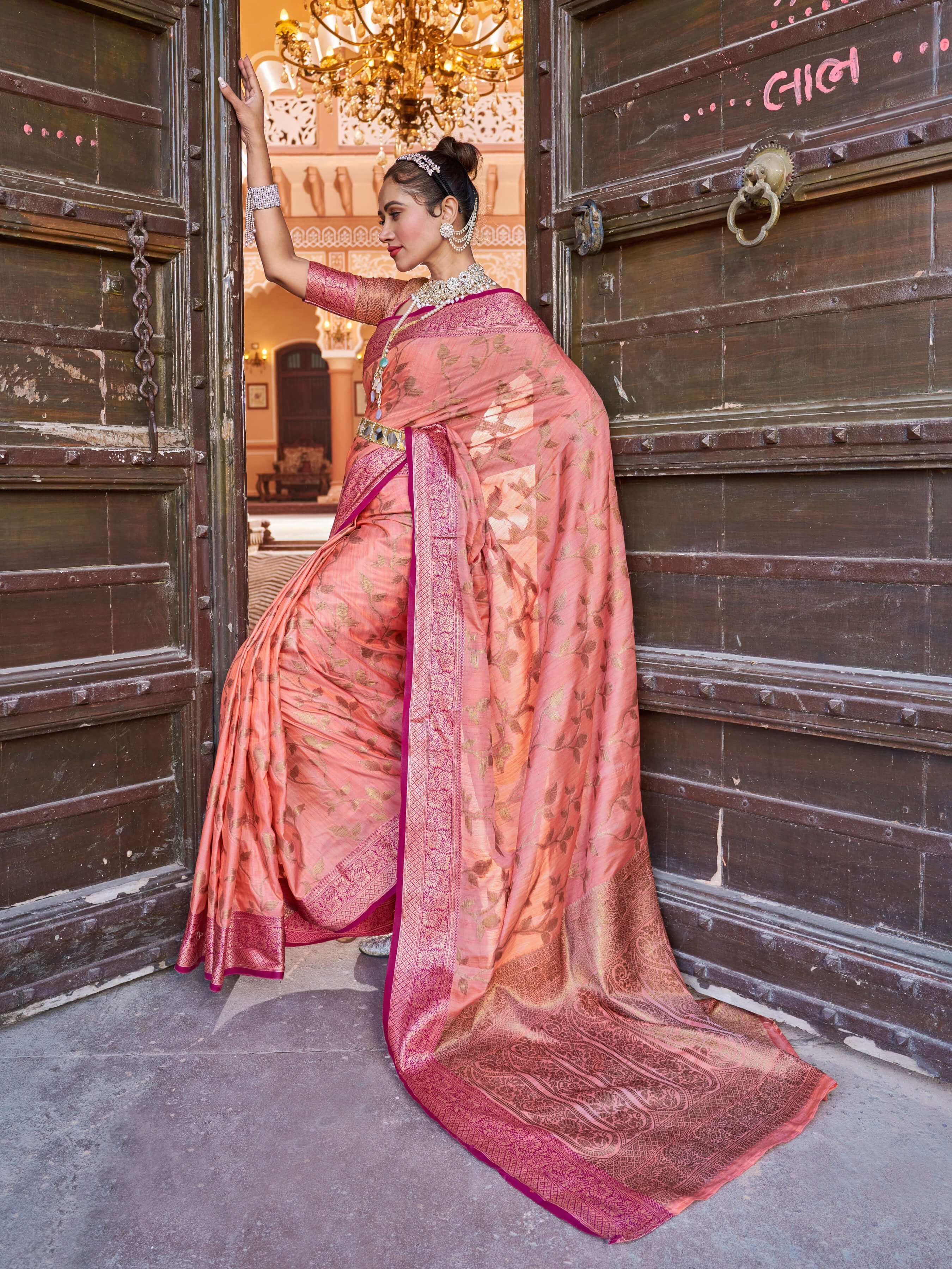 Smashing Peach Soft Banarasi Silk Saree With Flamboyant Blouse Piece