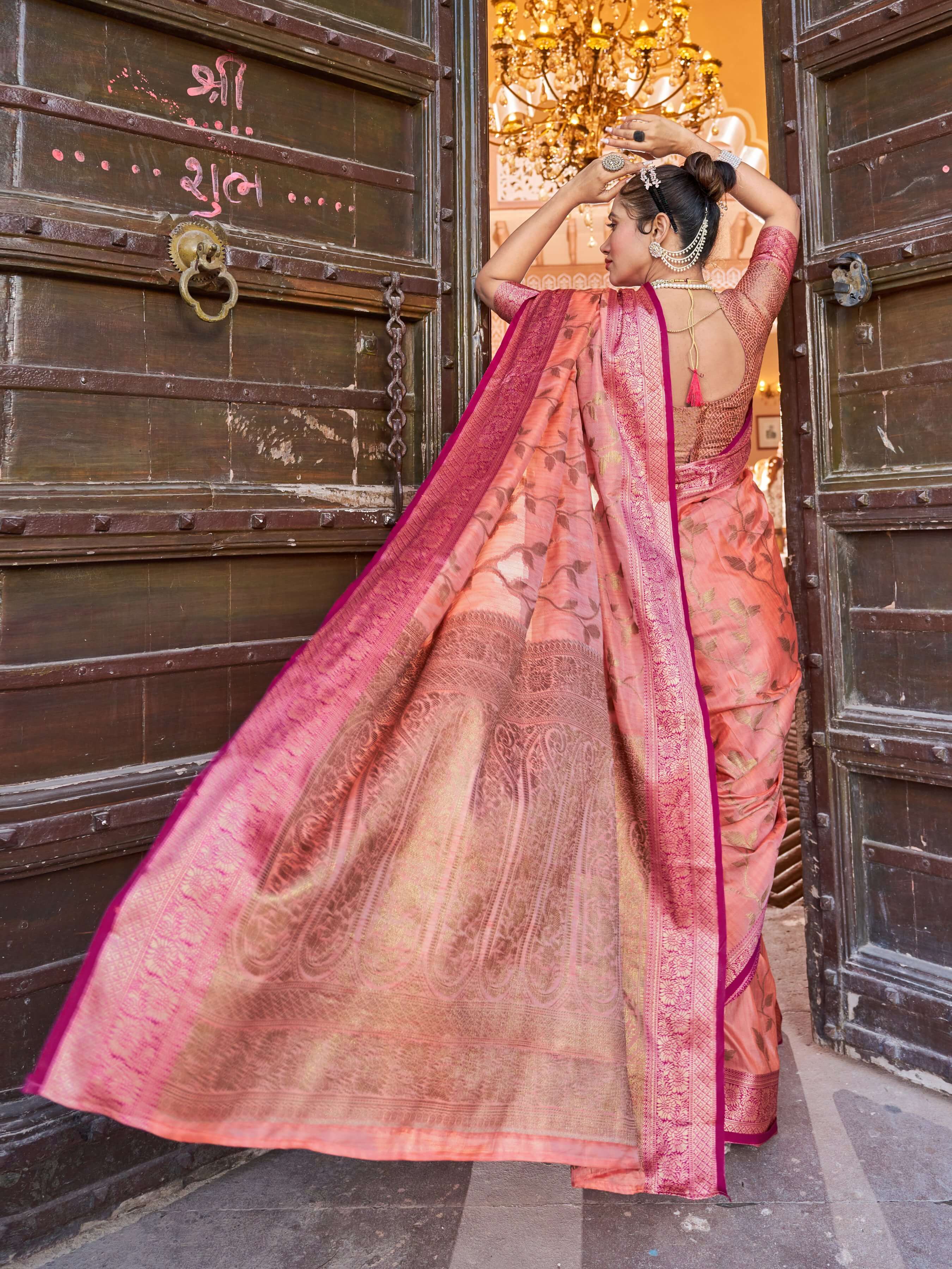 Smashing Peach Soft Banarasi Silk Saree With Flamboyant Blouse Piece