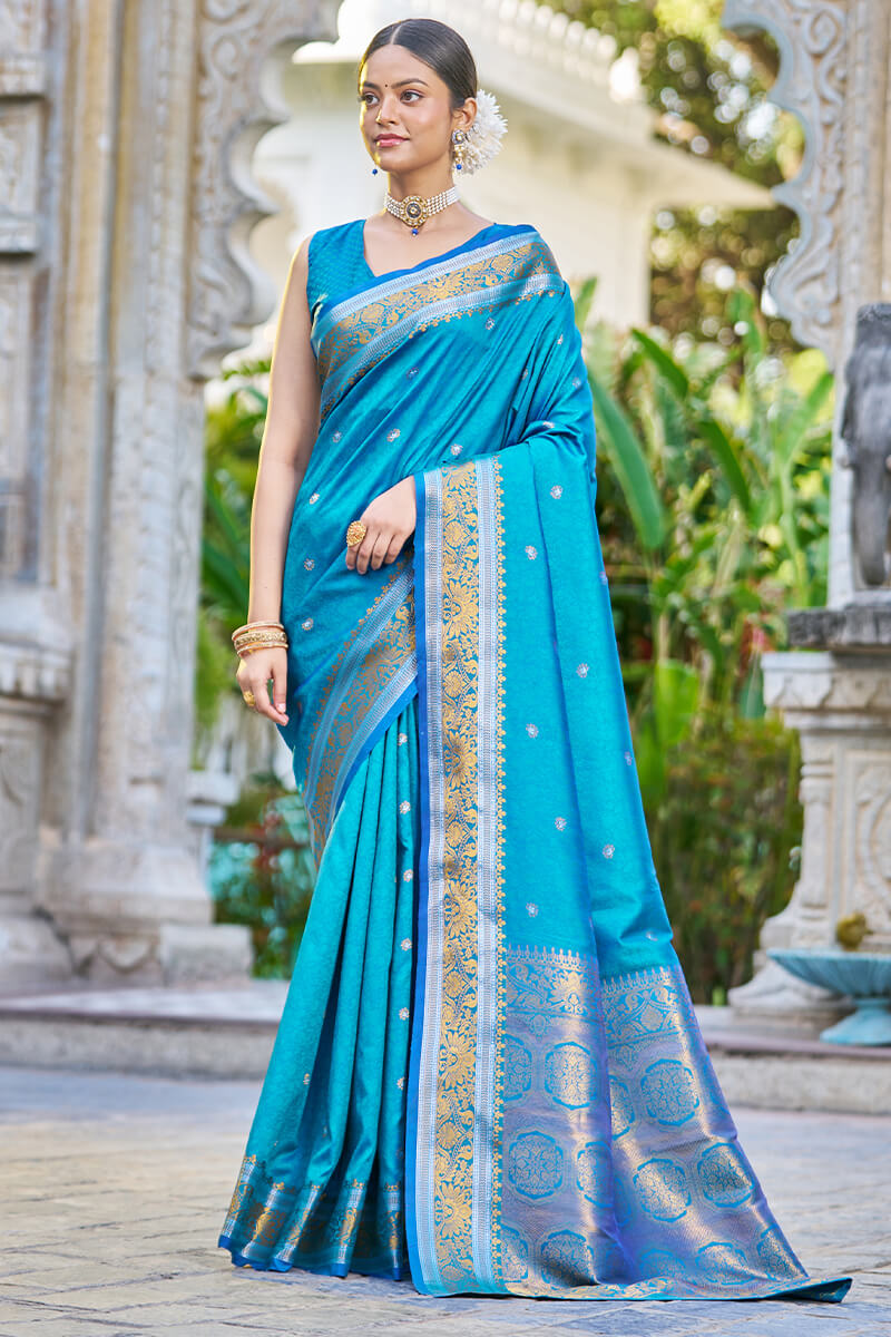 Blooming Firozi Kanjivaram Silk Saree With Traditional Blouse Piece