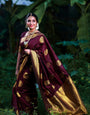 Most Wine Soft Banarasi Silk Saree With Gratifying Blouse Piece