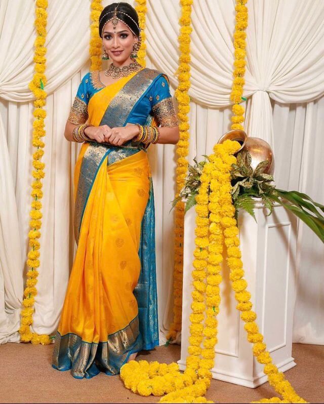 Majesty Yellow Soft Banarasi Silk Saree With Angelic Blouse Piece