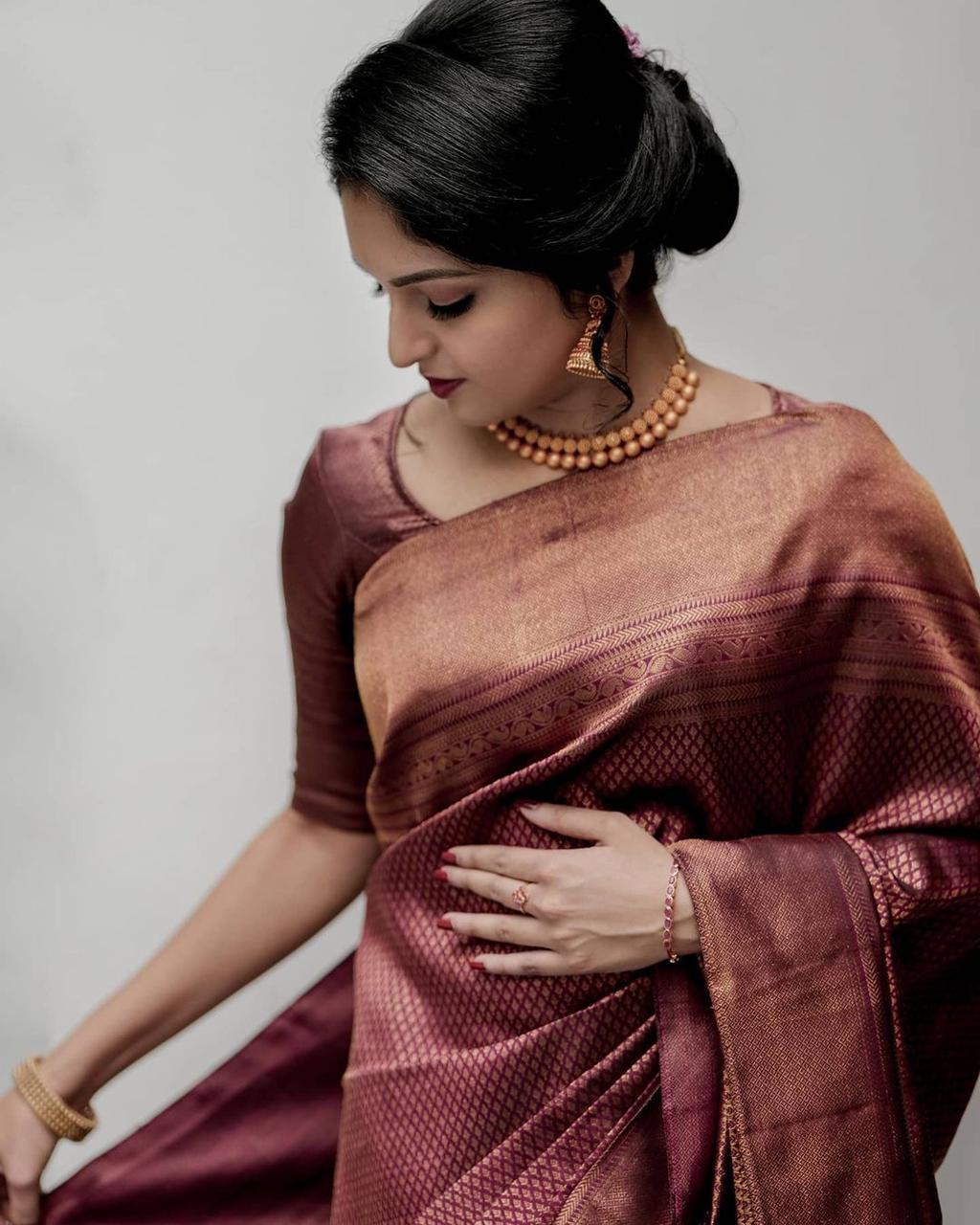 Mellifluous Maroon Soft Silk Saree With Demure Blouse Piece