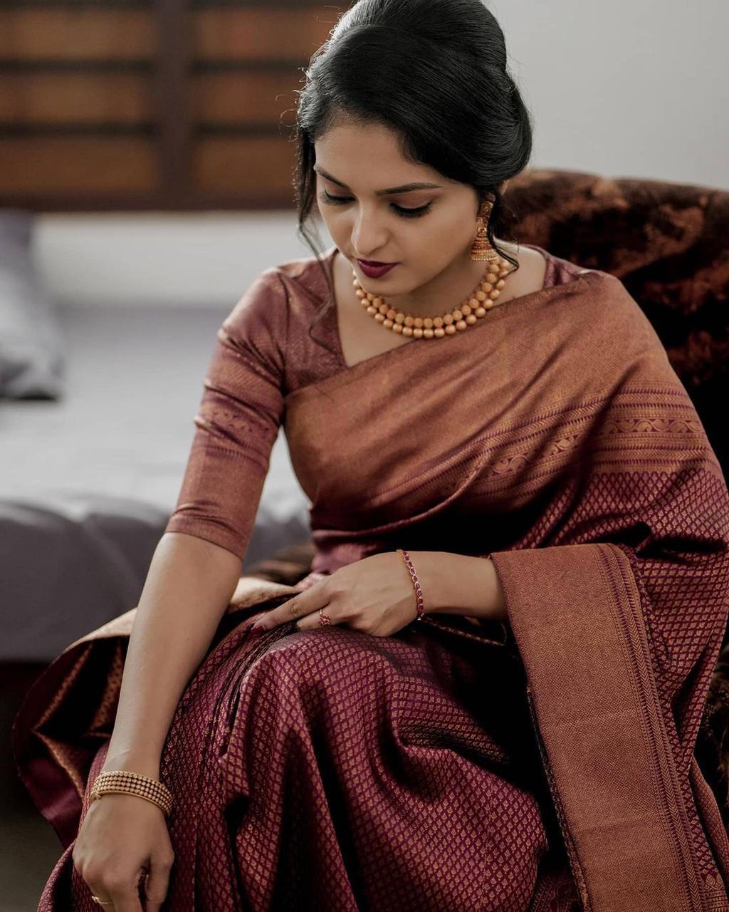 Mellifluous Maroon Soft Silk Saree With Demure Blouse Piece