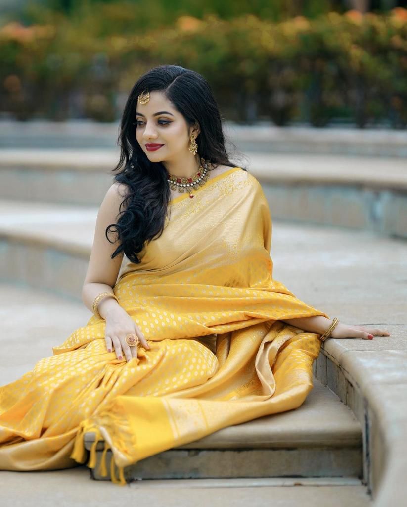 Glittering Yellow Soft Banarasi Silk Saree With Sensational Blouse Piece