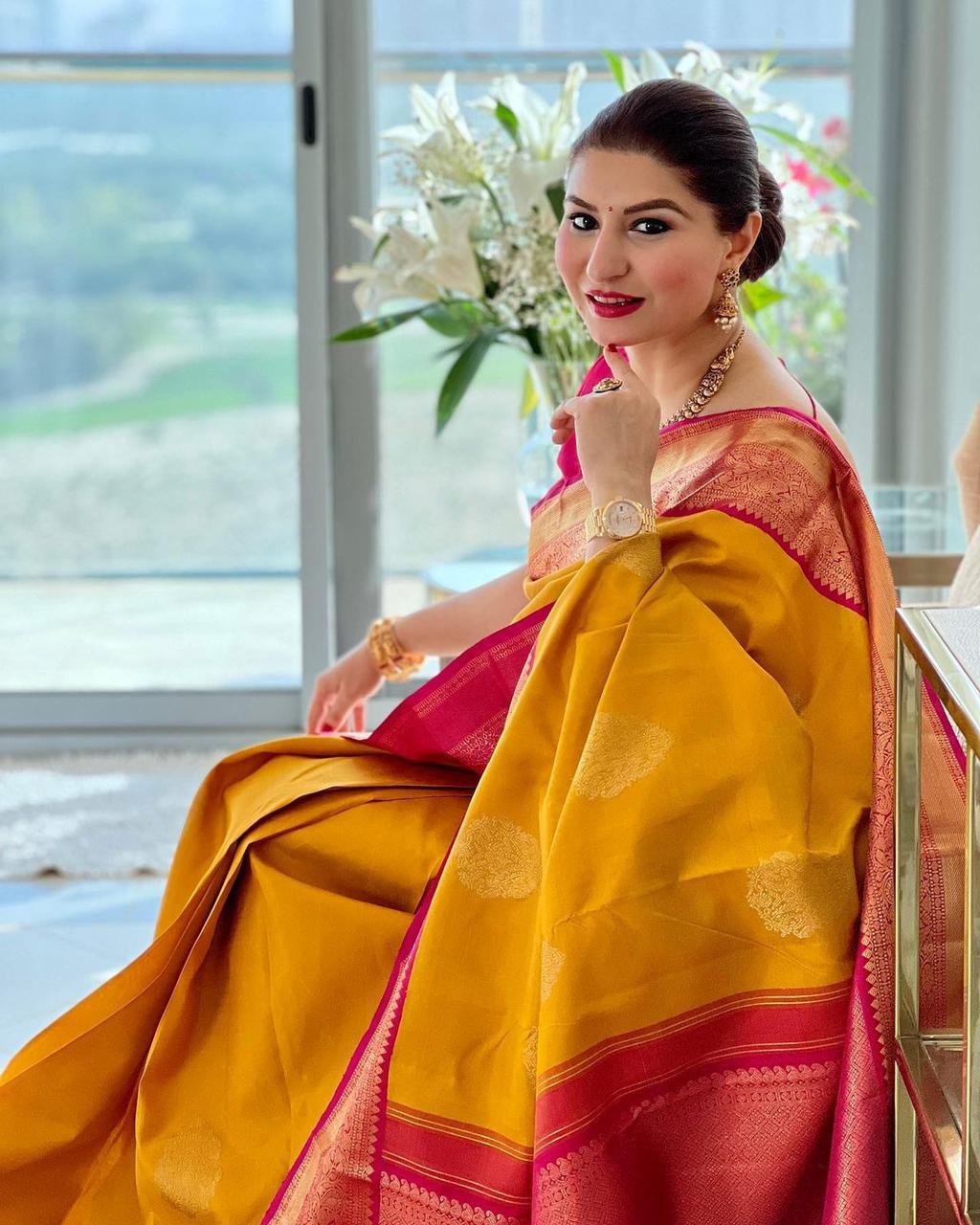 Dissemble Yellow Soft Banarasi Silk Saree With Blissful Blouse Piece
