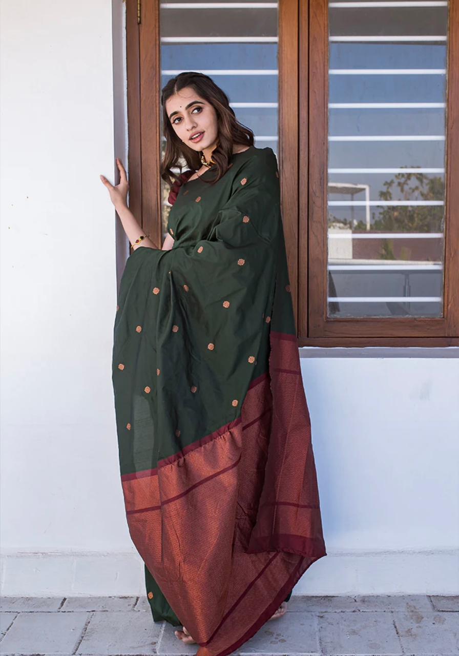 Devastating Dark Green Soft Silk Saree With Staggering Blouse Piece