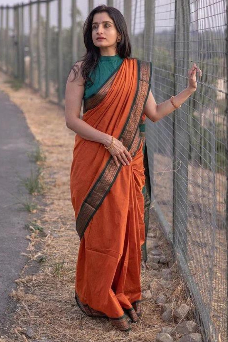 Beleaguer Orange Soft Silk Saree With Nectarous Blouse Piece