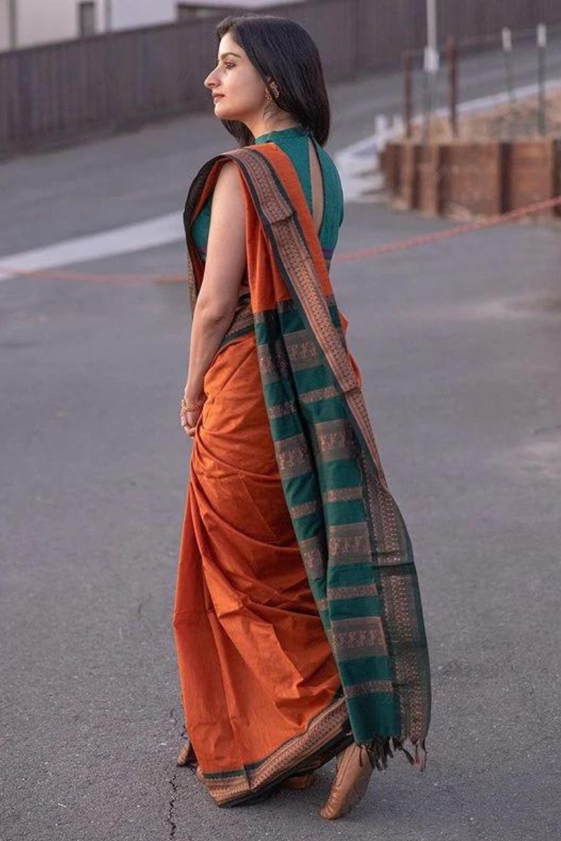 Beleaguer Orange Soft Silk Saree With Nectarous Blouse Piece