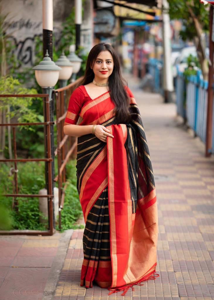 Mesmerising Black Soft Silk Saree With Resonant Blouse Piece