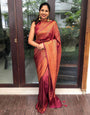 Exuberant Wine Soft Banarasi Silk Saree With Magnificat Blouse Piece