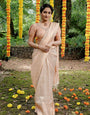 Fugacious Cream Soft Kanjivaram Silk Saree With Gossamer Blouse Piece