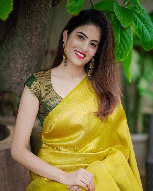 Divine Yellow Soft Silk Saree with Excellent Blouse Piece