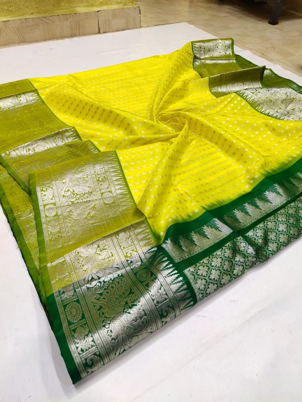 Energetic Lemon Soft Banarasi Silk Saree With Alluring Blouse Piece