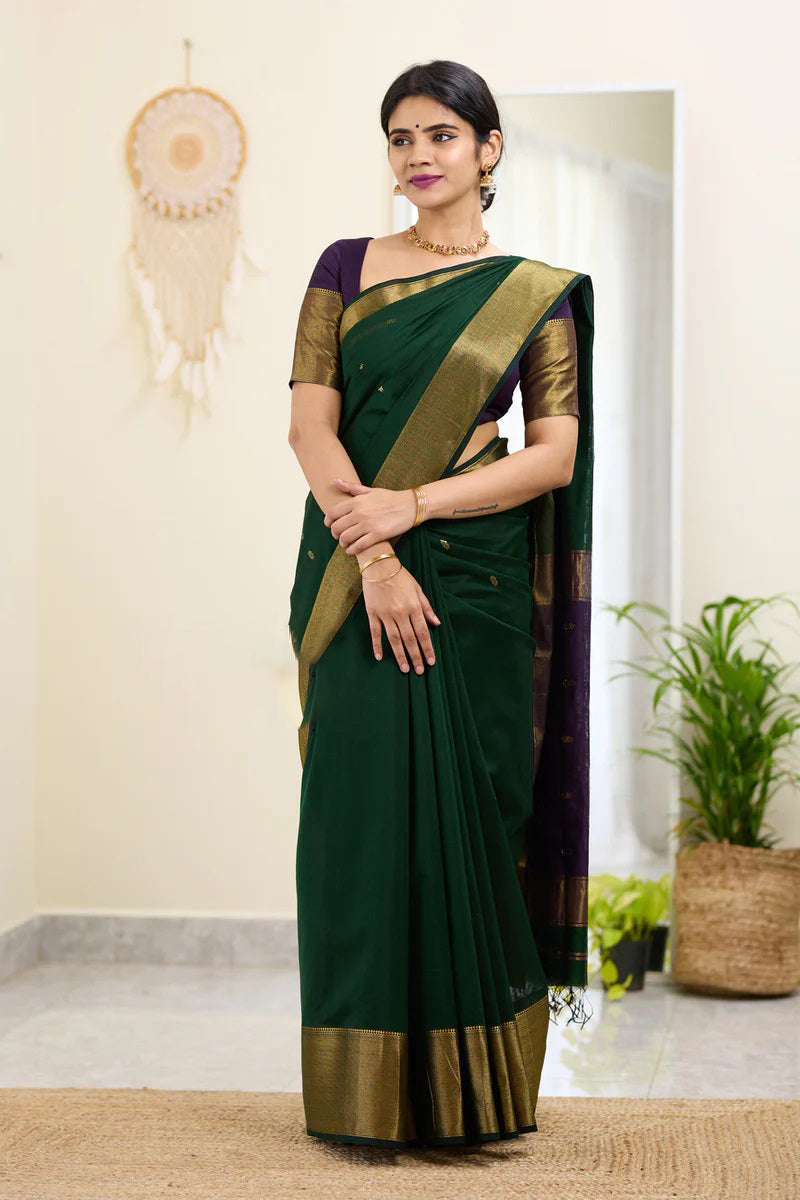 Traditional Dark Green Cotton Silk Saree With Enticing Blouse Piece