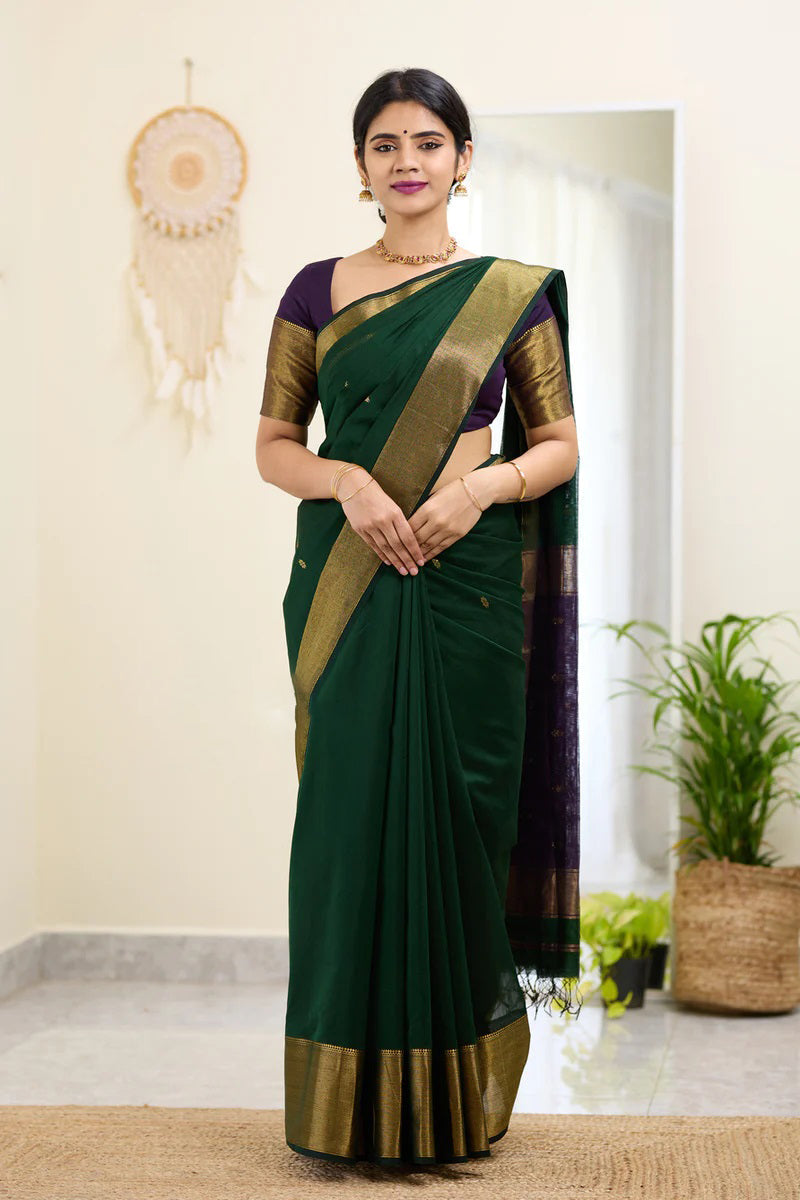 Traditional Dark Green Cotton Silk Saree With Enticing Blouse Piece