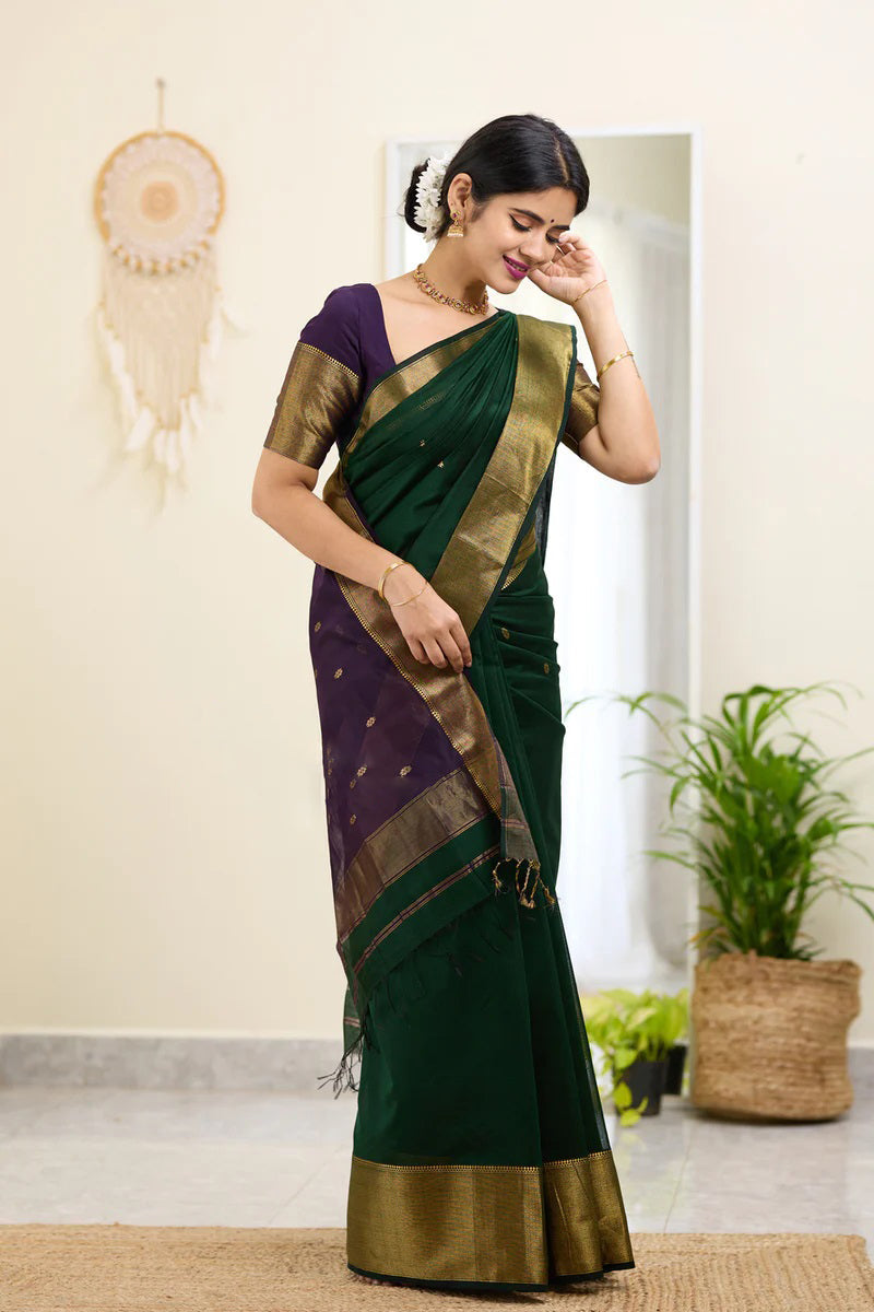 Traditional Dark Green Cotton Silk Saree With Enticing Blouse Piece