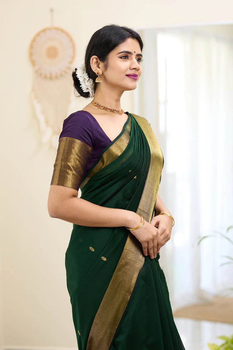 Traditional Dark Green Cotton Silk Saree With Enticing Blouse Piece