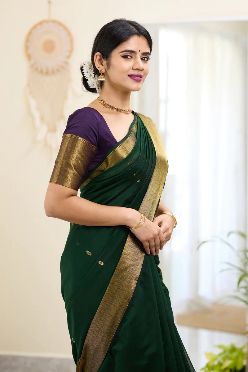 Traditional Dark Green Cotton Silk Saree With Enticing Blouse Piece