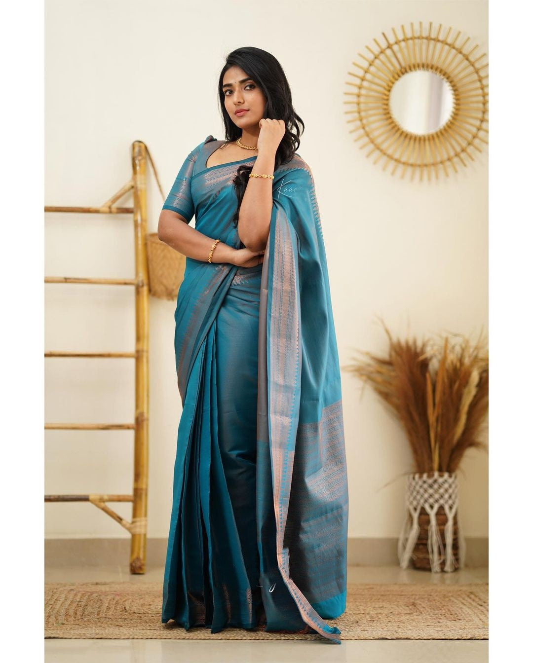 Luxuriant Firozi Soft Silk Saree With Elaborate Blouse Piece