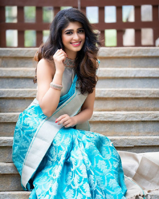 Outstanding Firozi Soft Banarasi Silk Saree With Prettiest Blouse Piece