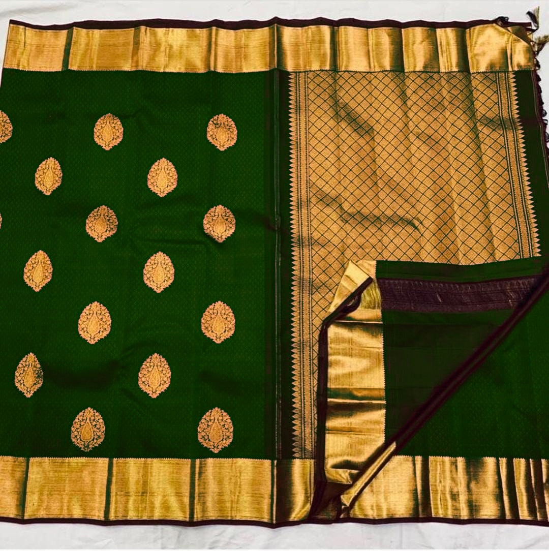 Ideal Dark Green Soft Banarasi Silk Saree With Lissome Blouse Piece