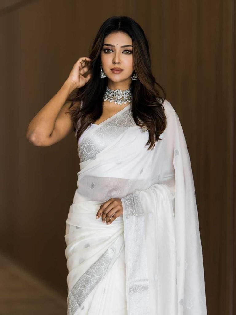 Bewitching White Soft Silk Saree With Cynosure Blouse Piece