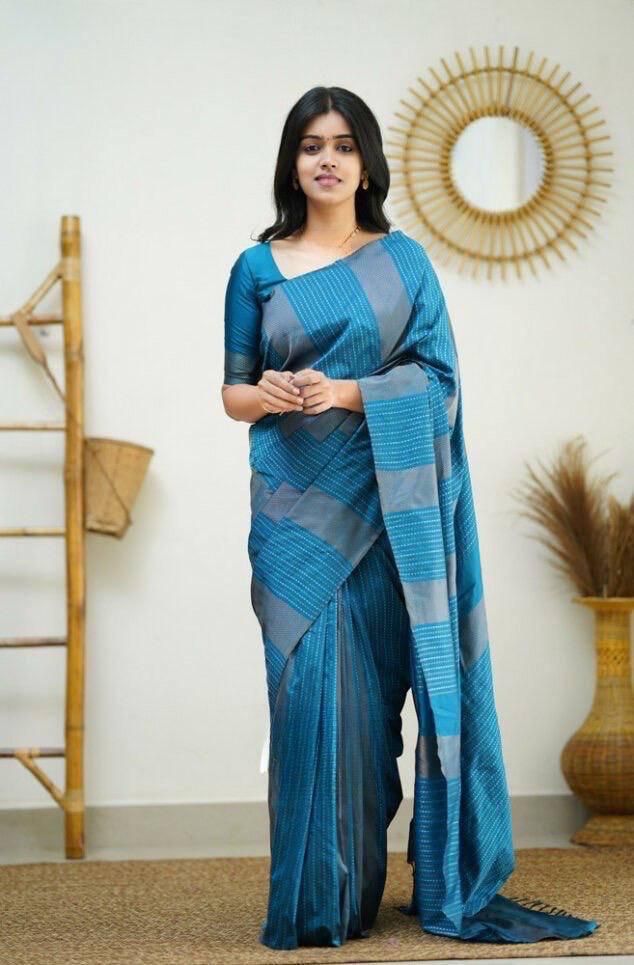 Mesmeric Firozi Soft Silk Saree With Enchanting Blouse Piece