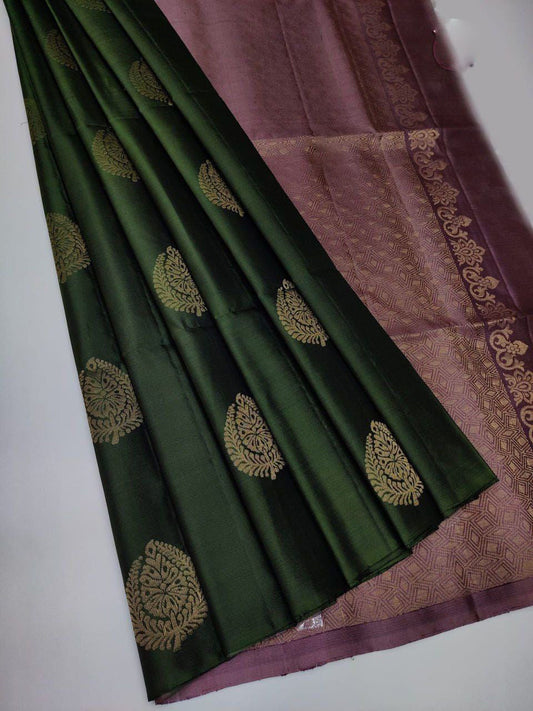 Dissemble Green Soft Silk Saree With Inimitable Blouse Piece
