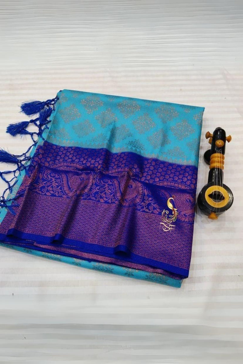 Petrichor Firozi Soft Banarasi Silk Saree With Lovely Blouse Piece