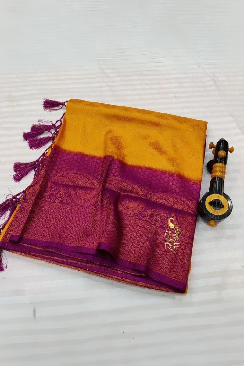 Nemesis Mustard Soft Banarasi Silk Saree With Admirable Blouse Piece