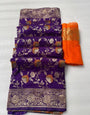 Cynosure Purple Soft Banarasi Silk Saree With Desultory Blouse Piece