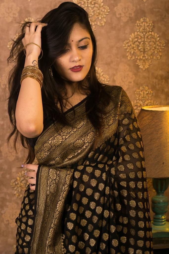 Brood Black Soft Banarasi Silk Saree With Gleaming Blouse Piece