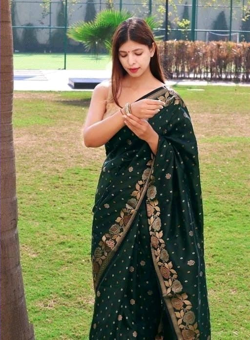 Embrocation Dark Green Soft Banarasi Silk Saree With Elision Blouse Piece