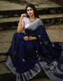 Engrossing Navy Blue Soft Silk Saree With Glowing Blouse Piece